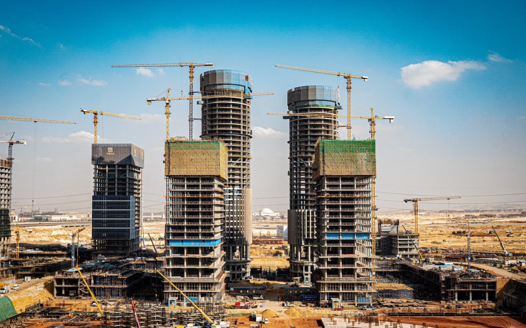 a group of tall buildings under construction